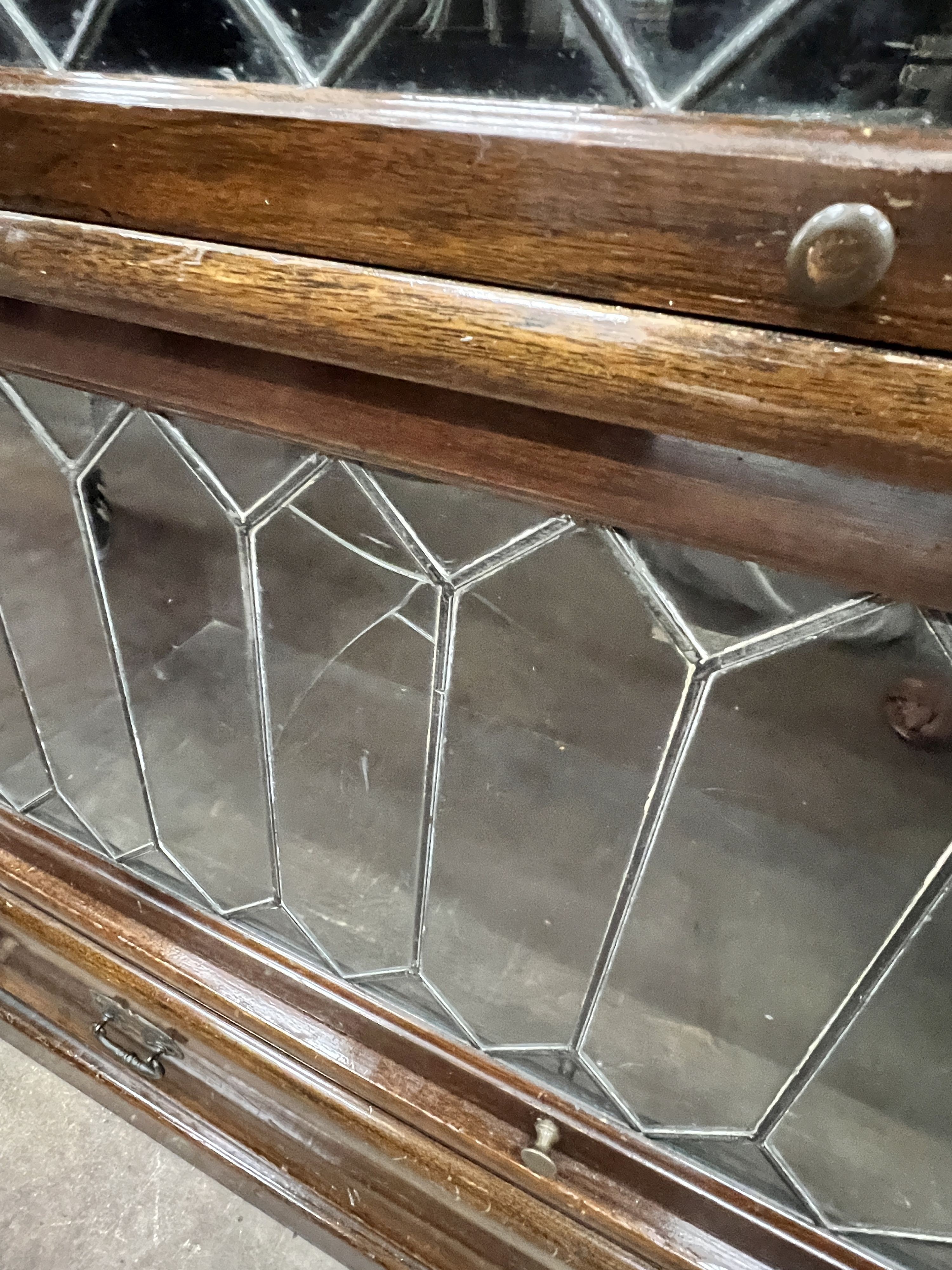 A Globe Wernicke six section mahogany bookcase with leaded glazed doors, length 87cm, depth 29cm, height 206cm